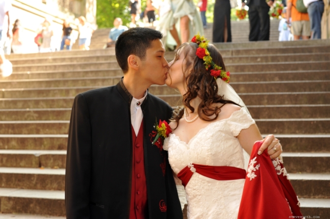 Kissing in Front of the Stairs by: Steve Worth